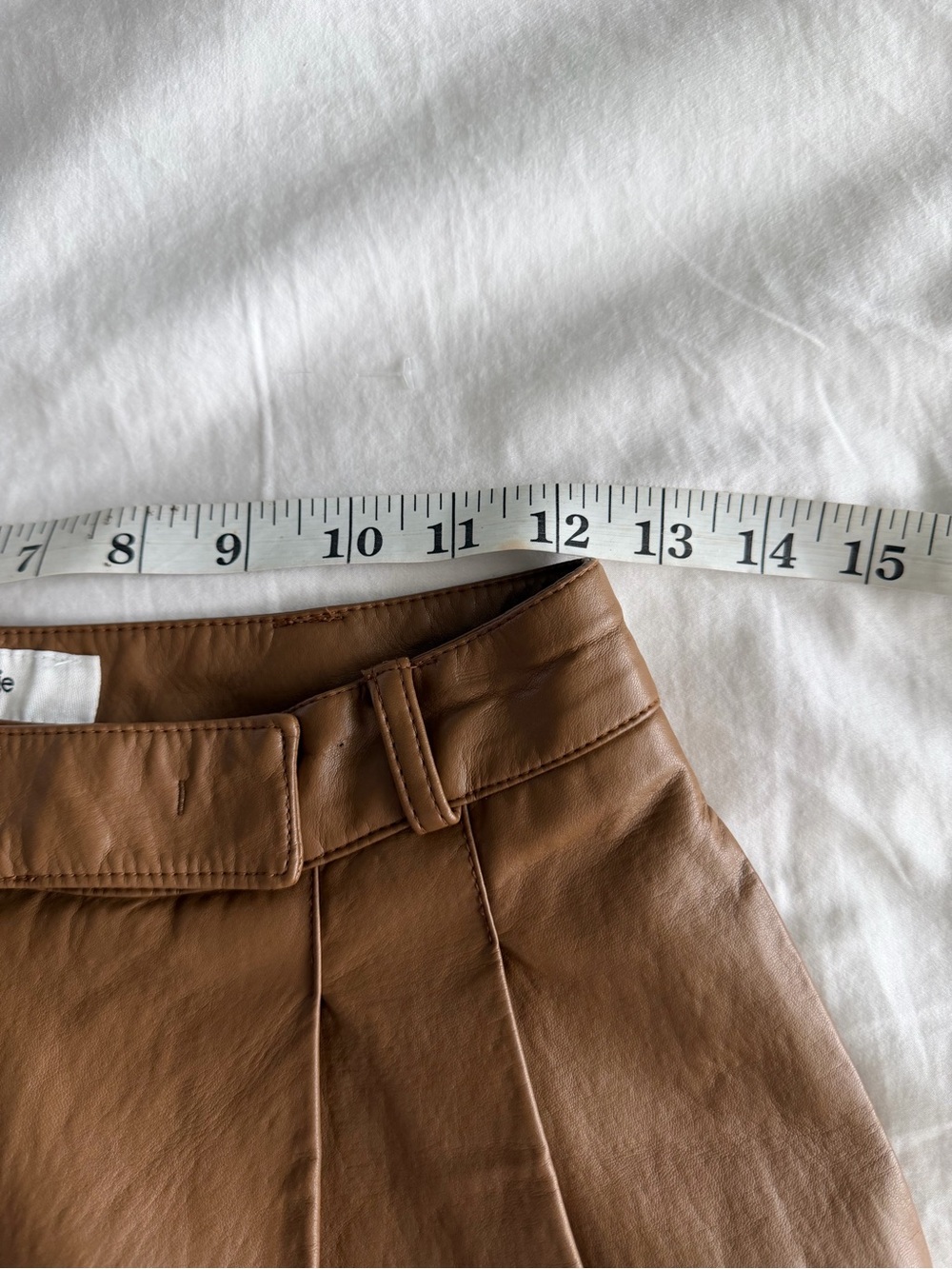 The Frankie Shop Pernille Pleated Faux Leather Shorts in Brown - Picture 13 of 16
